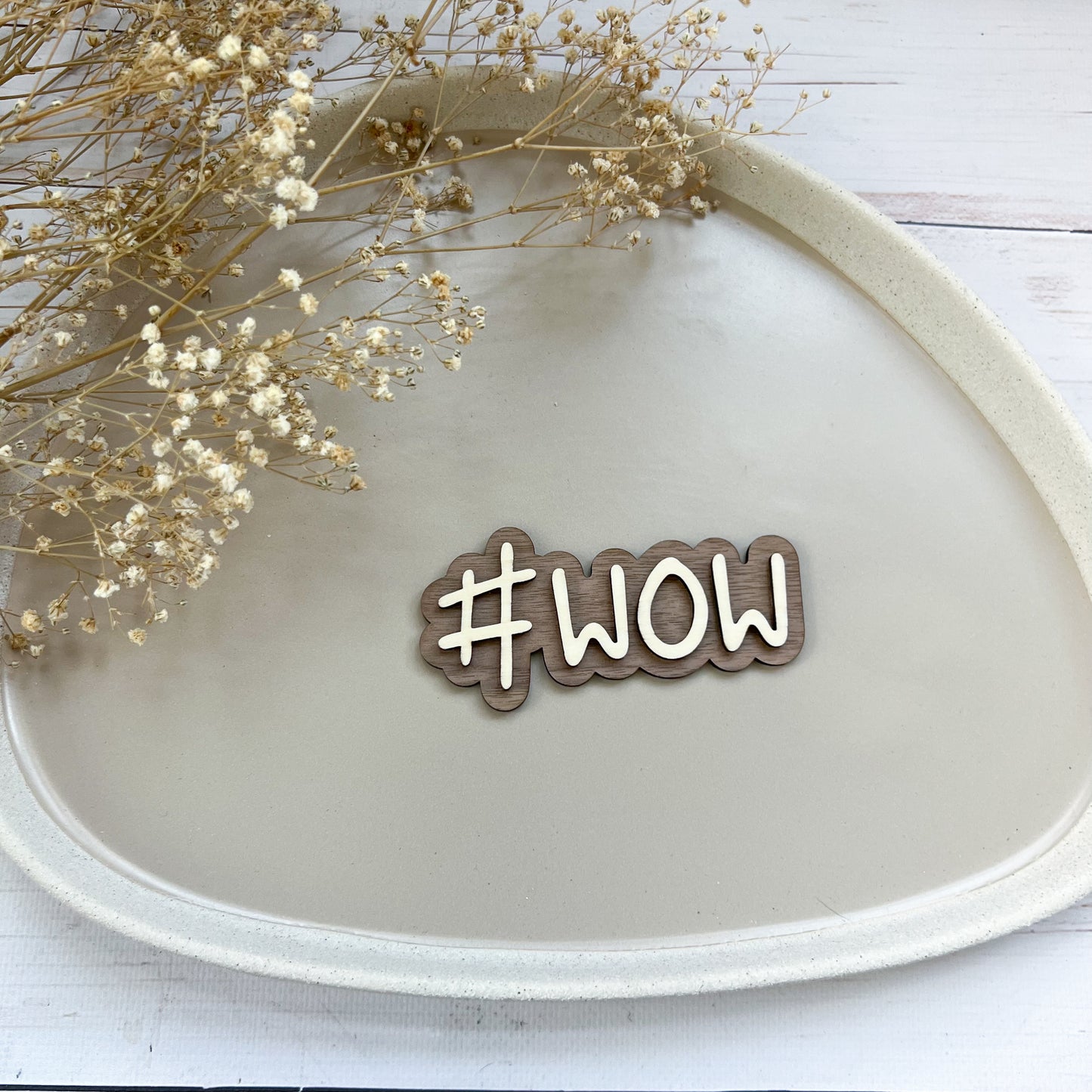 Schild - #WOW