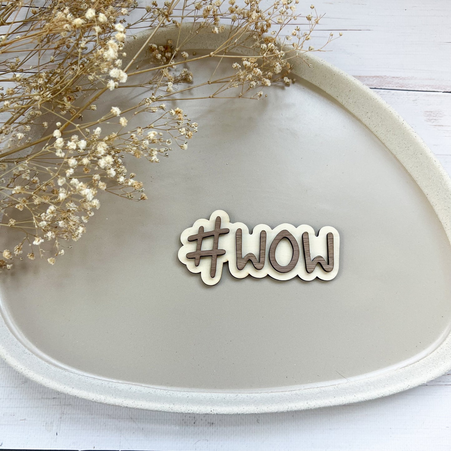 Schild - #WOW