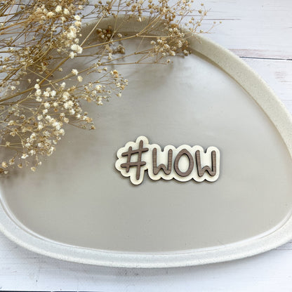 Schild - #WOW